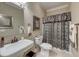 Bathroom featuring a sink, toilet, and shower with patterned curtain at 101 Firestone Ct, Summerville, SC 29483