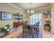 Bright dining area featuring a rustic table set and decorative wall art at 101 Firestone Ct, Summerville, SC 29483