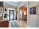 Elegant foyer with hardwood floors, a decorative rug, and a view into the dining room at 101 Firestone Ct, Summerville, SC 29483