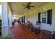Relaxing covered porch featuring a cozy seating area, perfect for enjoying peaceful moments outdoors at 101 Firestone Ct, Summerville, SC 29483