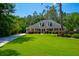 Charming single-story home boasting a well-manicured lawn, mature trees, and inviting curb appeal at 101 Firestone Ct, Summerville, SC 29483