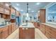 Spacious kitchen featuring wooden cabinets, granite countertops, and stainless steel appliances at 101 Firestone Ct, Summerville, SC 29483