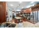 Well-appointed kitchen showcasing granite countertops, stainless steel appliances, custom cabinets and eat-in center island at 101 Firestone Ct, Summerville, SC 29483