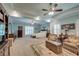 Spacious main bedroom with tray ceilings, a ceiling fan, and large windows for natural light at 101 Firestone Ct, Summerville, SC 29483