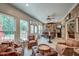 Charming sun room offering comfortable seating and views of the landscaped backyard at 101 Firestone Ct, Summerville, SC 29483