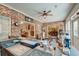 Versatile sunroom features a brick accent wall, a bar, and an abundance of light and seating space at 101 Firestone Ct, Summerville, SC 29483