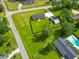 Spacious property featuring a well-maintained lawn, detached garage, and mature trees in a desirable neighborhood at 101 Parkside Dr, Goose Creek, SC 29445