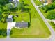Spacious property featuring a well-maintained lawn, detached garage, and mature trees in a desirable neighborhood at 101 Parkside Dr, Goose Creek, SC 29445