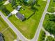 Spacious property featuring a well-maintained lawn, detached garage, and mature trees in a desirable neighborhood at 101 Parkside Dr, Goose Creek, SC 29445