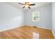 Well lit bedroom with hardwood floors, ceiling fan and lots of natural light at 101 Parkside Dr, Goose Creek, SC 29445