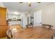 Spacious kitchen and dining room with hardwood floors and open layout at 101 Parkside Dr, Goose Creek, SC 29445