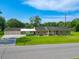 Traditional brick home with a large yard, covered parking, and a charming front porch at 101 Parkside Dr, Goose Creek, SC 29445