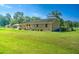 Charming single story brick home with a covered carport and well-manicured lawn, creating a warm curb appeal at 101 Parkside Dr, Goose Creek, SC 29445