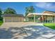 Spacious driveway leads to garage and covered parking, offering ample space for vehicles and storage at 101 Parkside Dr, Goose Creek, SC 29445