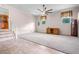 Large living room featuring neutral carpeting and tile flooring at 101 Parkside Dr, Goose Creek, SC 29445