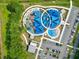 Aerial view of a colorful playground with shade structures and adjacent parking area at 101 Parkside Dr, Goose Creek, SC 29445