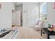 Bright bedroom boasts a cute toddler bed, a comfy chair, and ample natural light at 1014 Peridote Way, Ladson, SC 29456