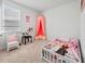 Charming bedroom with pink canopy bed, chair, and decorations for a  at 1014 Peridote Way, Ladson, SC 29456