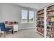 Bedroom features carpet, desk, bookcase, and large windows providing natural light at 1017 Marsh Royal St, Summerville, SC 29485