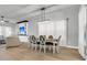 Elegant dining room featuring a stylish table with seating for six and modern pendant lighting at 1017 Marsh Royal St, Summerville, SC 29485