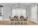 Elegant dining room featuring a stylish table with seating for six and modern pendant lighting at 1017 Marsh Royal St, Summerville, SC 29485