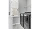 Bright laundry room with tile floors, a window for natural light, and modern washer and dryer units at 1017 Marsh Royal St, Summerville, SC 29485
