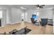 Spacious living room with ample seating and an exercise machine at 1017 Marsh Royal St, Summerville, SC 29485