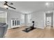 Spacious living room with ample seating and an exercise machine at 1017 Marsh Royal St, Summerville, SC 29485