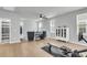 Spacious living room with ample seating and an exercise machine at 1017 Marsh Royal St, Summerville, SC 29485