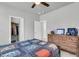 Large main bedroom showcases ceiling fan, carpet, furniture and access to the closet and bathroom at 1017 Marsh Royal St, Summerville, SC 29485