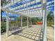 Charming pergola with swings overlooking a playground, blending relaxation with community activity at 1017 Marsh Royal St, Summerville, SC 29485