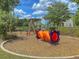 Colorful community playground with a slide and climbing structure, perfect for Gathering fun and recreation at 1017 Marsh Royal St, Summerville, SC 29485