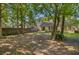 This home features a large and shady backyard, a privacy fence, mature trees and lush plantings at 105 Moon Shadow Ln, Summerville, SC 29485