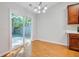 Eat-in kitchen with stainless appliances, a dining area, and patio access at 105 Moon Shadow Ln, Summerville, SC 29485