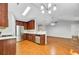 Open-concept kitchen and living room with stainless appliances and hardwood floors at 105 Moon Shadow Ln, Summerville, SC 29485