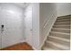 Foyer staircase with carpet and doors, along with wood flooring at 105 Moon Shadow Ln, Summerville, SC 29485