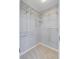 Organized walk-in closet with adjustable shelving and carpeted flooring at 105 Moon Shadow Ln, Summerville, SC 29485