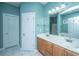 Spacious bathroom with double vanity, white cabinets, and tiled floors at 105 Northpark Ave, Summerville, SC 29485