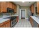 Modern kitchen with tile flooring, stainless steel appliances and plenty of cabinet space at 105 Northpark Ave, Summerville, SC 29485