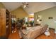 Spacious living room with vaulted ceilings, hardwood floors, and a comfortable sofa and chairs at 105 Northpark Ave, Summerville, SC 29485