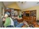 Comfortable living room featuring hardwood floors, a vaulted ceiling, and cozy furniture at 105 Northpark Ave, Summerville, SC 29485