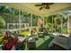 Cozy screened porch with comfortable seating, perfect for enjoying the outdoors and relaxing at 105 Northpark Ave, Summerville, SC 29485