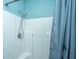 Clean and bright shower area with white tiled walls and a modern shower head at 105 Northpark Ave, Summerville, SC 29485