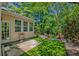 Backyard patio featuring mature landscaping at 106 Sago Palm Ct, Summerville, SC 29483