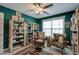 Bedroom featuring built-in bookshelves, a ceiling fan, carpet and furnishings at 106 Sago Palm Ct, Summerville, SC 29483