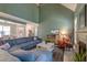 Cozy living room with fireplace, comfortable seating, and views into the dining area at 106 Sago Palm Ct, Summerville, SC 29483