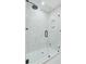 Bathroom features a large glass shower with rain shower head and built-in shelving at 108 E Walker Dr, Summerville, SC 29483