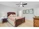 Bedroom with a wooden bed frame, vintage wood furniture, and neutral-colored walls at 108 E Walker Dr, Summerville, SC 29483