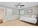 Bedroom features hardwood floors, a ceiling fan, and neutral paint at 108 E Walker Dr, Summerville, SC 29483