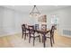 Dining area with dark wood table and chandelier lighting at 108 E Walker Dr, Summerville, SC 29483